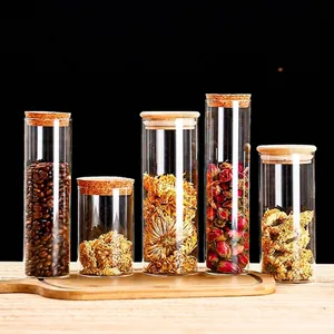 Set of 5 clear glass storage jars with bamboo and cork lids for kitchen food storage