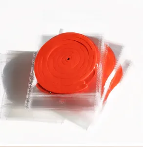 Detail of red spiral ceiling streamers in clear packaging for party decoration