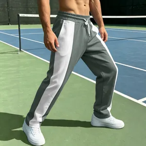 Men's dark grey jogger pants with contrast side stripes and white drawstring waist