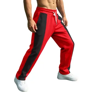 Men's loose jogger pants in red and black color block with drawstring waist