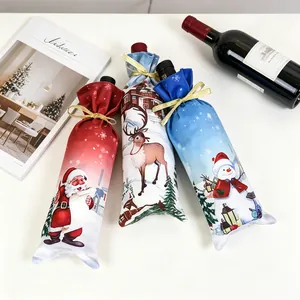 Detailed view of Christmas wine bottle bags with Santa, reindeer and snowman prints