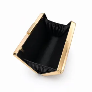 Elegant gold-framed acrylic evening clutch bag with black lining and metal chain hooks
