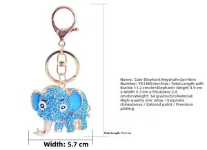 Detailed macro view showing the blue rhinestones and gold alloy texture of the elephant charm