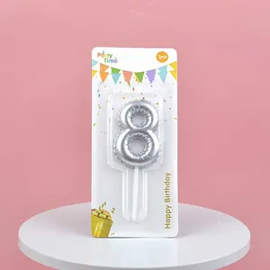 Detailed view of silver balloon style number 8 birthday candle in its retail packaging