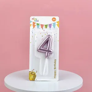 Premium metallic pink number 4 birthday candle in original packaging on white stand