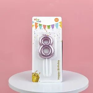 Pink metallic number 8 birthday candle with balloon texture shown on retail card display.