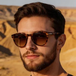 Macro detail of tortoiseshell sunglasses frame with silver arrow metal hinge design