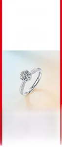 Detail of S925 sterling silver ring featuring a six-prong moissanite setting and side stones