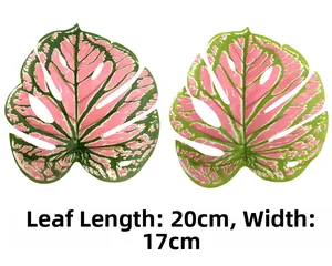 Detailansicht künstlicher Monstera-Blätter in Pink und Grün, Größe 20x17 cm breit