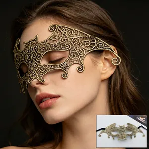 Golden bat-shaped lace masquerade mask for Halloween parties with intricate cutout patterns