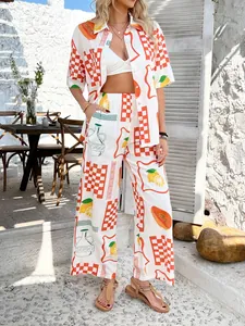 Detail of bohemian set with citrus pattern, short-sleeved shirt and wide-leg trousers