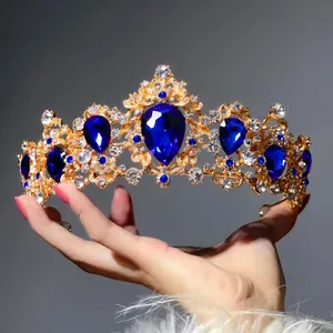 Baroque vintage bridal crown with blue teardrop crystals and gold alloy base
