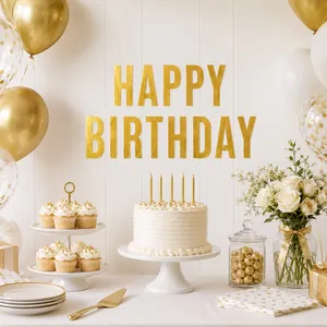 3-inch gold stamped alphabet stickers forming Happy Birthday on a clean white wall
