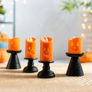 Halloween LED pumpkin candle light with orange face and black spider web base decor