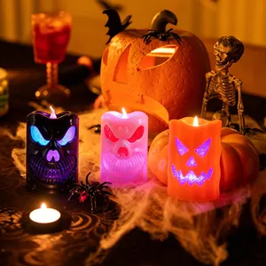 Halloween pumpkin lanterns with LED candles in skull and ghost faces, set of three colors