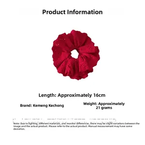 Detailed view of red lace scrunchie with hollow embroidery showing 16cm size and 21g weight