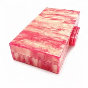 Starry acrylic evening clutch bag with pink marble texture and gold chain strap