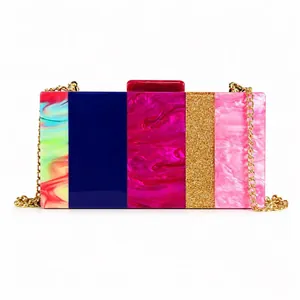 Colorful striped acrylic clutch bag with marble patterns and golden chain strap