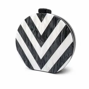 Modern acrylic evening clutch bag with black and white V-pattern and chain strap