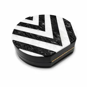 Vintage evening acrylic clutch with black and white marble chevron pattern and gold chain