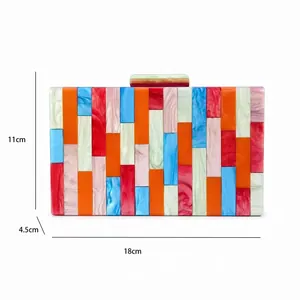 Detailed view of colorful acrylic clutch bag with marble patterns measuring 18x11x4.5 cm