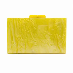 Pochette de soirée élégante en acrylique jaune marbré avec fermoir métallique pour mariages