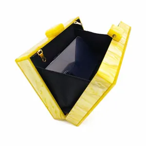 Pochette de soirée en acrylique jaune marbré avec espace intérieur pour smartphone