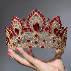 Luxury gold crown with red pear-cut gems and sparkling rhinestones for bridal weddings