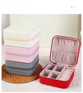 Detail of portable PU leather jewelry boxes showing internal compartments and multiple colors