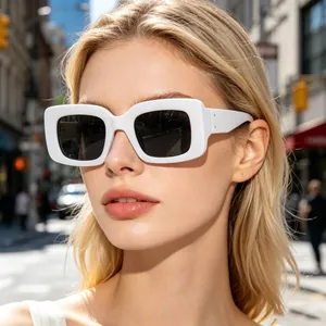 Fashionable white rectangular sunglasses with dark lenses and stylish metal dot details