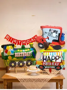 Transportation theme birthday party set with foil vehicle balloons and banner