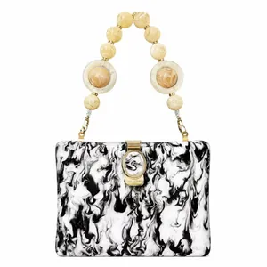 Artistic acrylic box clutch with marble texture and large beaded resin top handle