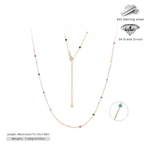 Detail of 925 sterling silver gold necklace with colorful beads and 5A zircon accents
