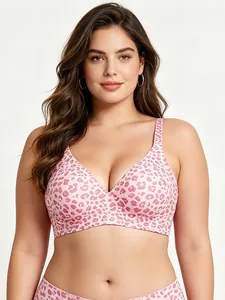 Close-up of pink leopard print seamless bra and matching panties set on model