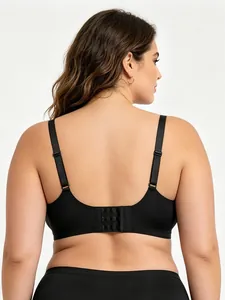 Detail of wide adjustable straps and multi-hook back closure on black plus size bra