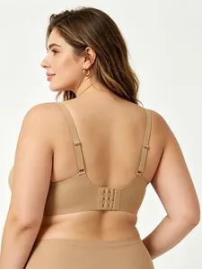 Detail of adjustable straps and seamless back closure on a nude soft support t-shirt bra