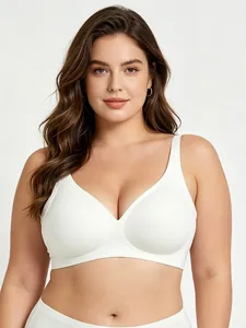 Front view of white seamless deep V bra with wide shoulder straps for full support