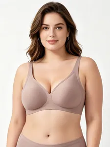 Detail of seamless taupe deep V bra showing smooth fabric and supportive wide straps