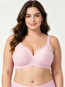 Detail of a seamless light pink deep V-neck bra set with smooth stretch fabric and soft support