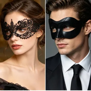 Detail of elegant black lace masquerade eye mask and matte textured half-face mask for couples