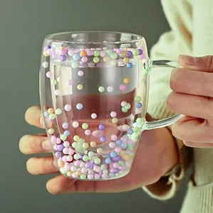 Double walled high borosilicate glass cup with colorful macaron foam balls inside