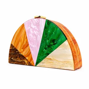 Semicircle acrylic evening bag with colorful marble texture and gold metal clasp