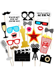 Detail of 33-piece Hollywood party photo props with movie camera, clapboard and popcorn