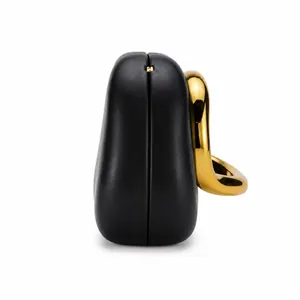 Elegant black leather shell-shaped evening clutch bag with chunky gold metal handle
