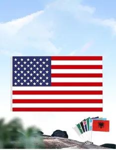 Close-up of World Cup fan flags including USA stars and stripes with metal grommets