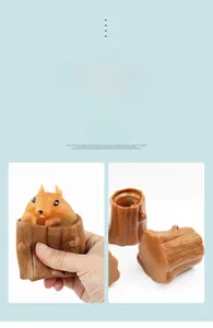 Macro detail of brown stump toy showing orange squirrel popping up during squeezing