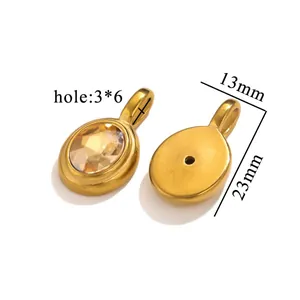Macro detail of oval pendant featuring yellow faceted gemstone and golden base with dimensions