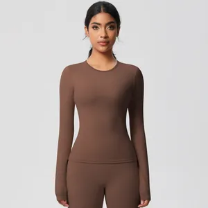 Detail view of brown tight-fit yoga set with high-elastic matte quick-dry fabric texture