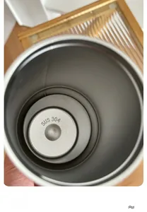 Detail view of the food-grade SUS 304 stainless steel interior of the 30oz thermal mug
