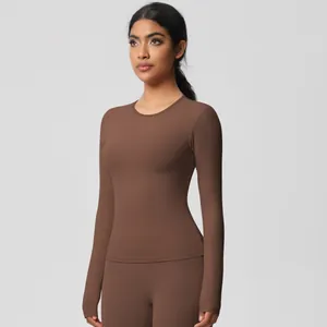 Detailed close-up of dark brown slim-fit yoga set with high-stretch moisture-wicking fabric